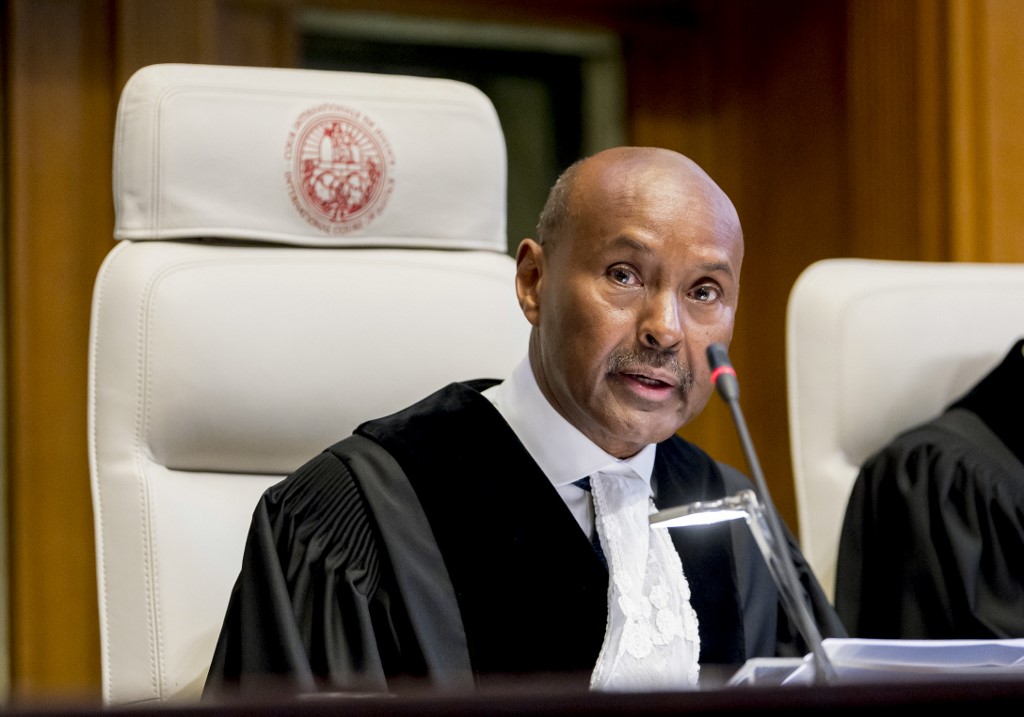 A handout photo released on December 10, 2019 by the International Court of Justice shows International Court of Justice (ICJ) Judge and court president Abdulqawi Ahmed Yusuf speaking during the case of The Gambia v. Myanmar at the Peace Palace in The Hague. (Frank Van Beek / UN / ICJ/ AFP)