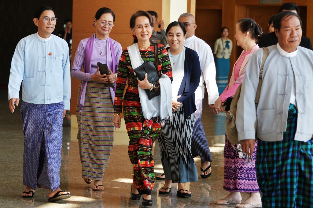 Myanmar's State Counselor Aung San Suu Kyi arrives back in Naypyidaw on December 14, 2019. (Thet Aung / AFP)