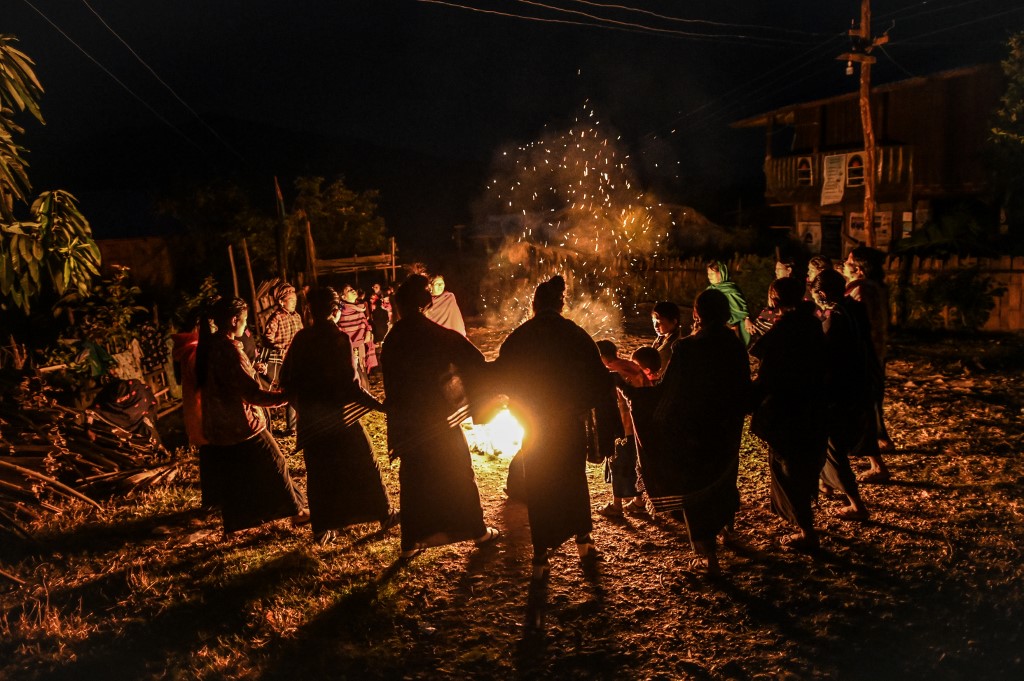 This photo taken on February 6, 2020 shows Naga tribeswomen taking part in an overnight ceremony to bless the harvest in Satpalaw Shaung village, Lahe township in Myanmar's Sagaing region. (Ye Aung Thu / AFP)