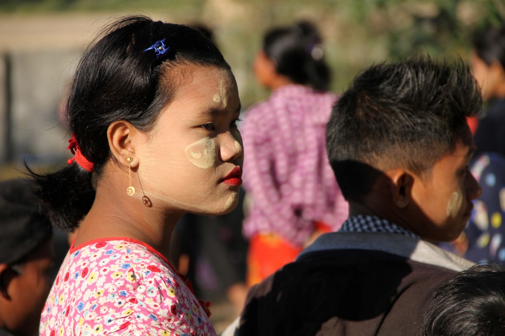  In this file photo taken on January 25, 2019, Mro ethnic women with children displaced from the surge of fighting between ethnic armed rebel group of the Arakan Army and government troops take refuge at a compound of a Buddhist pagoda. (Richard Sargent / AFP)