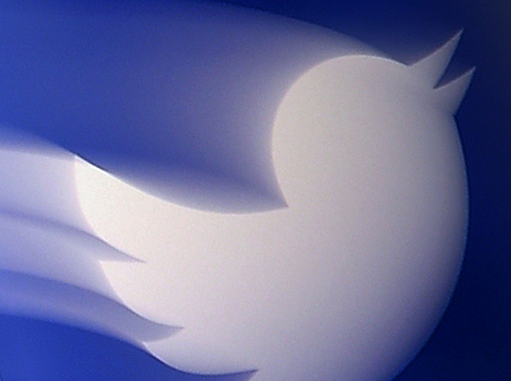 In this file photo illustration taken on August 10, 2020 shows a Twitter logo displayed on a mobile phone. (AFP)