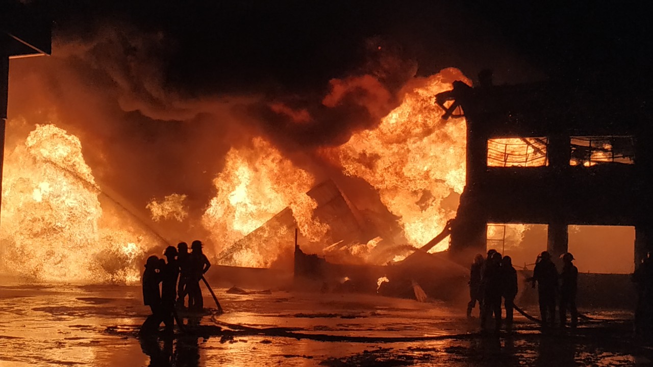 Firefighters battle a blaze in Dagon Seikkan. (Myanmar Fire Services Department / Facebook)