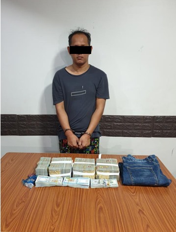 The suspect was charged for allegedly robbing a CB Bank branch in Yangon. (Ye Zarni Media / Facebook)