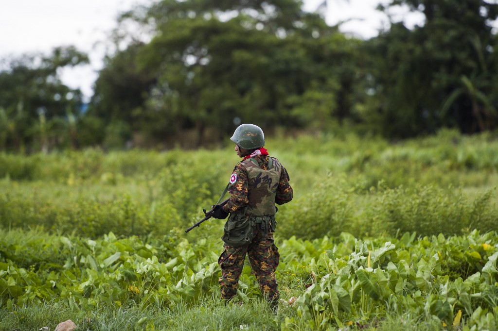 A Myanmar soldier guards an area at Sittwe airport. (AFP / Ye Aung Thu)