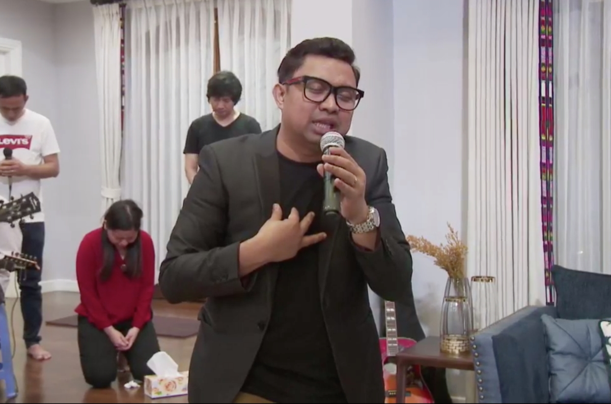 A screenshot of David Lah during a service that was broadcast online.