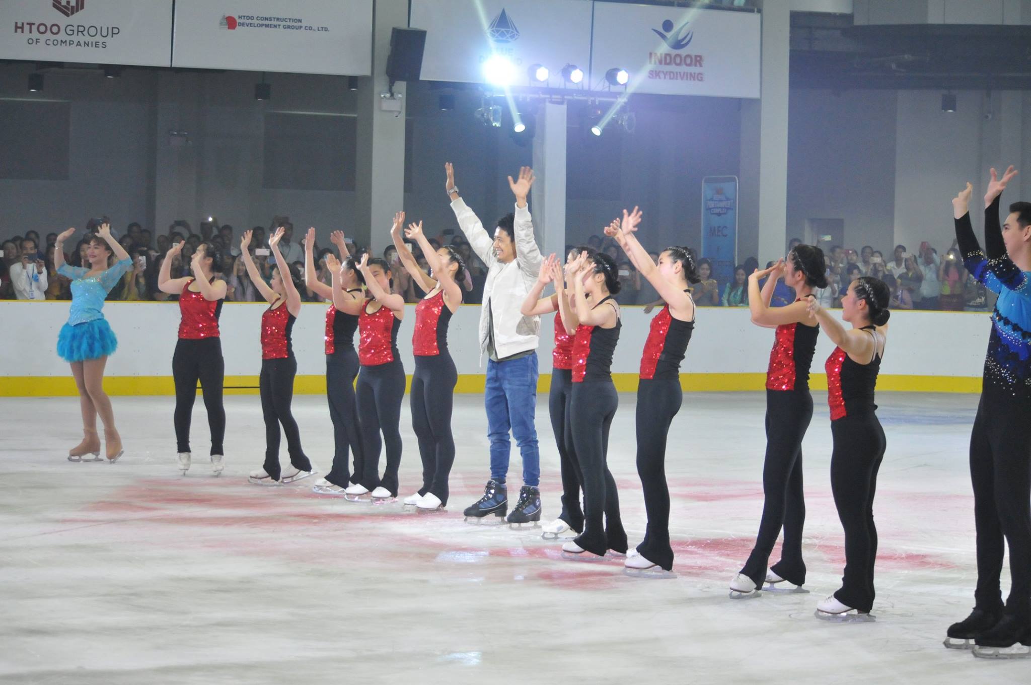 Skaters and a singer celebrate the opening on the rink. (Royal Sportainment Complex / Facebook) 