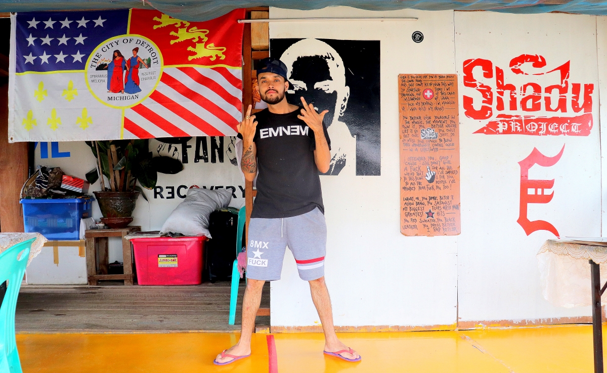 Eminem enthusiast ‘Stan’ stands in his Nyaung Shwe restaurant, which is dedicated to the US rapper. (Photos by Jeremy Burns)