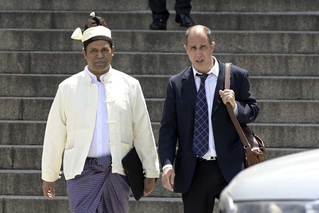  The President of The Burmese Rohingya Organisation UK (BROUK), Tun Khin (L) and Argentine human rights lawyer Tomas Ojea Quintana (R) leave Argentine federal court in Buenos Aires on November 13, 2019. (AFP)