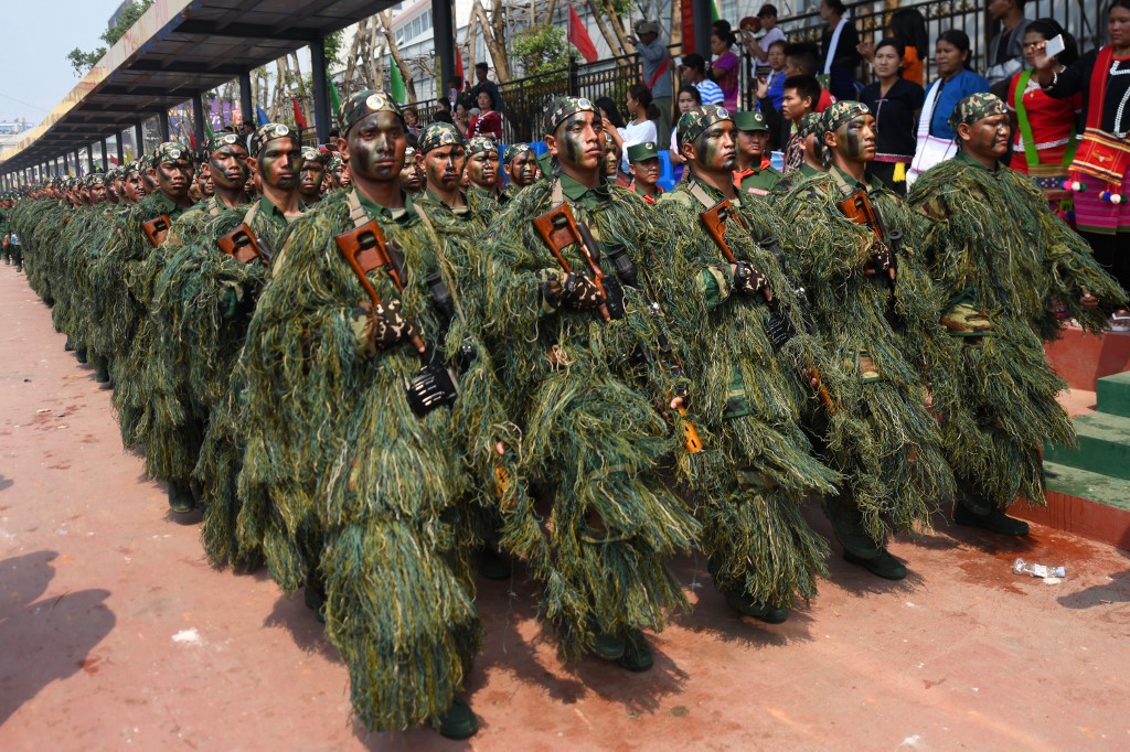 United Wa State Army (UWSA) special force snipers participate in a military parade, to commemorate 30 years of a ceasefire signed with the Myanmar military in the Wa State, in Panghsang on April 17. (Ye Aung Thu / AFP)  