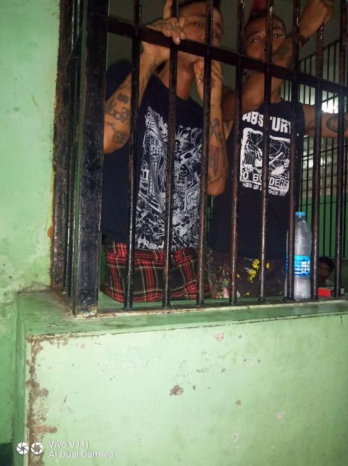 Kyaw Gyi (left) and Kyaw Kyaw in the cell.