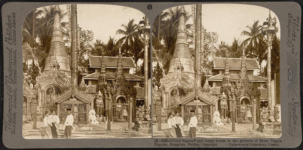 Gilded flagstaff and image house in the grounds of the Shwedagon Pagoda in Rangoon.