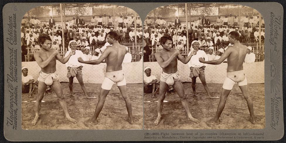Fight between best of 50 couples (champion at left) - funeral festivity in Mandalay.