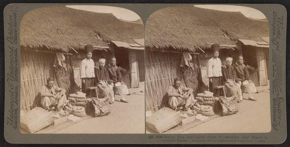 Native shop and varied types of customers near Mogok in northern Burma.