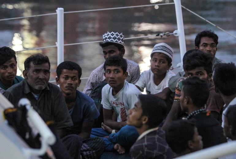 Rohingya refugees detained in Malaysia territorial waters off the island of Langkawi arrive at a jetty in Kuala Kedah, northern Malaysia on April 3, 2018. (AFP)