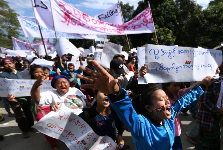 Demonstrators march in support of three local activists jailed by authorities during a rally in Myitkyina, capital of restive Kachin state on December 11, 2018. (Zau Ring Hpra / AFP)