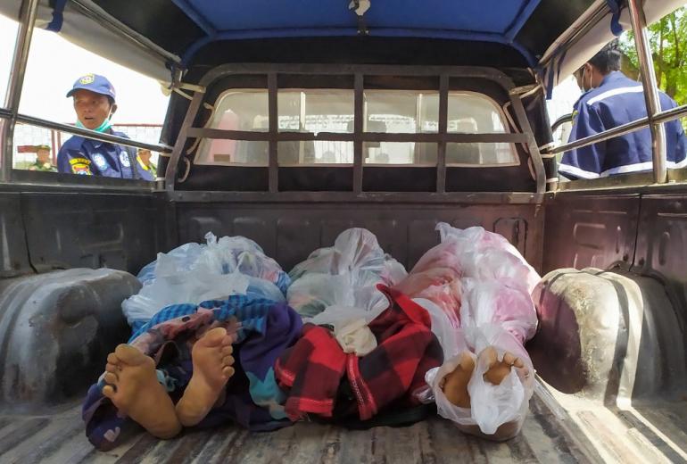  The bodies of prisoners are seen in the back of a vehicle after a riot in the Shwe Bo prison in Sagaing region on May 9, 2019. (Kaung Zaw Hein / AFP)