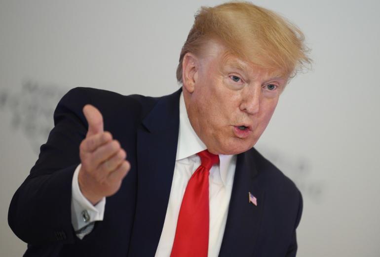 US President Donald Trump speaks during the Global Chief Executive Officers dinner at the World Economic Forum in Davos, Switzerland, on January 21, 2020. (Jim Watson / AFP)