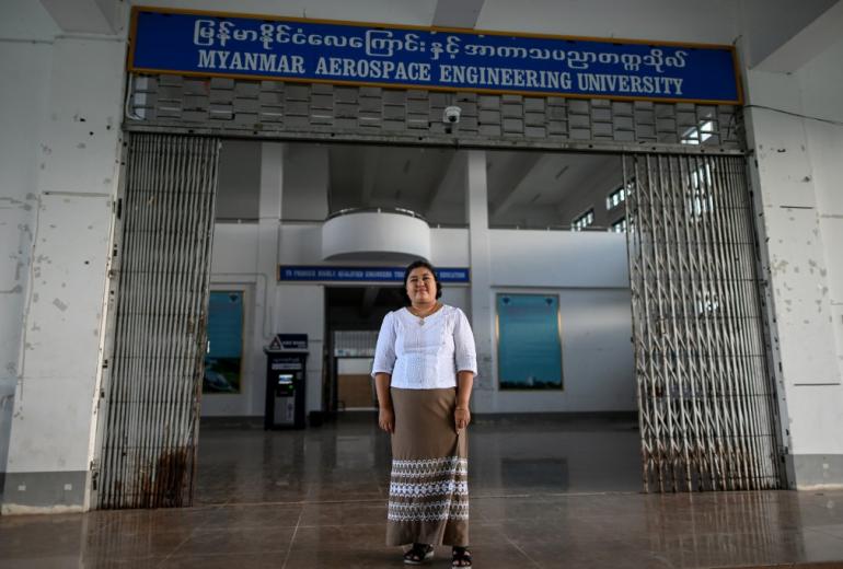 This photo taken on June 19, 2020 shows engineer Thu Thu Aung, 40, posing for a photo at the Myanmar Aerospace Engineering University in Meiktila. (Ye Aung Thu / AFP)