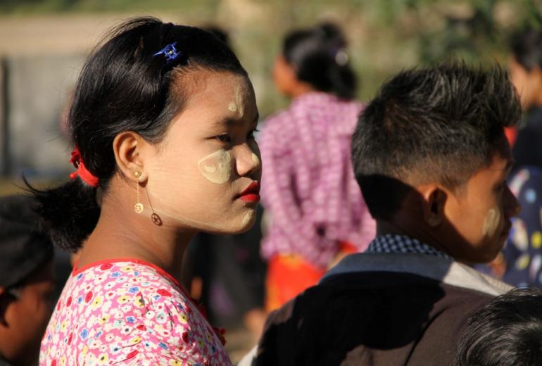  In this file photo taken on January 25, 2019, Mro ethnic women with children displaced from the surge of fighting between ethnic armed rebel group of the Arakan Army and government troops take refuge at a compound of a Buddhist pagoda. (Richard Sargent / AFP)