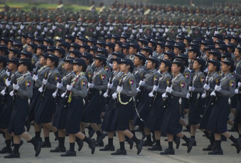 Myanmar police personnel march in formation during a ceremony to mark the 71th anniversary of Armed Forces Day in Myanmar's capital Naypyidaw on March 27, 2016. (Ye Aung Thu / AFP)