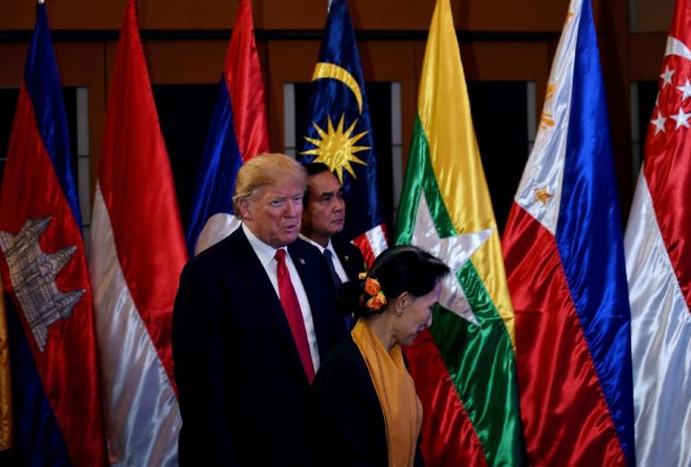 US President Donald Trump (L), Thailand's Prime Minister Prayut Chan-O-Cha (C) and Myanmar's State Counsellor and Foreign Minister Aung San Suu Kyi( R) arrive for a photo during the ASEAN-US 40th Anniversary commemorative Summit in Manila on November 13, 2017. (Manan Vatsyayana / AFP)