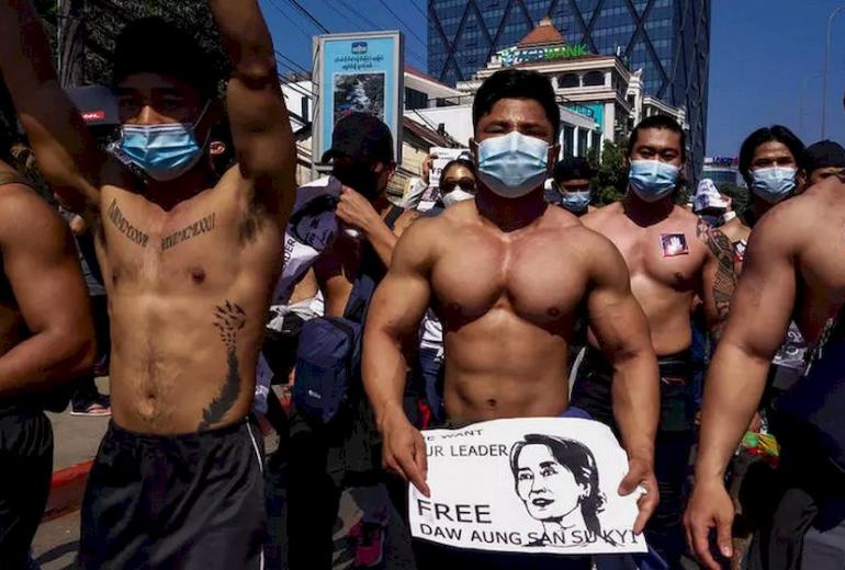 The fitness fanatics were among tens of thousands in Yangon undeterred from hitting the streets. (AFP)