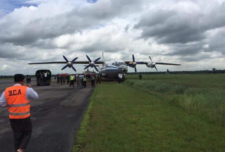 The Y-8 Myanmar military transport plane slide for about 2,300 feet at Yangon airport. (Myanmar Aviation Development Association / Facebook)