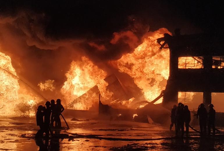 Firefighters battle a blaze in Dagon Seikkan. (Myanmar Fire Services Department / Facebook)