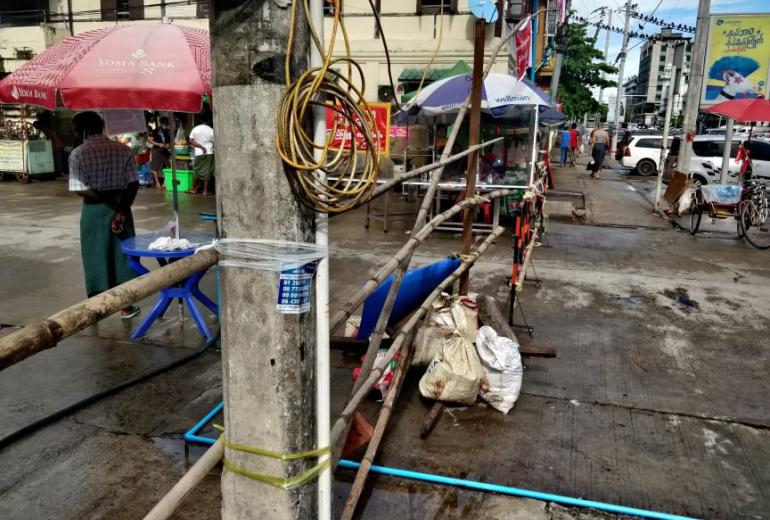 A makeshift barricade blocking upper 51 Street in downtown Yangon. (Myanmar Mix)