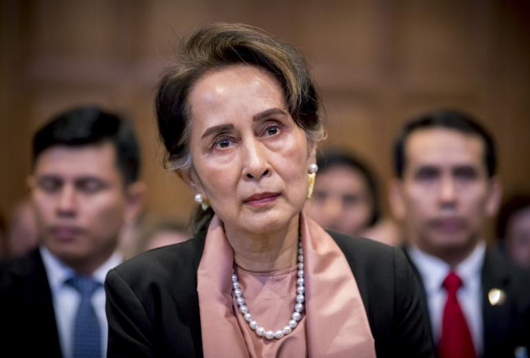 A handout photo released on December 10, 2019 by the International Court of Justice shows Myanmar's State Counsellor Aung San Suu Kyi attending the start of a three-day hearing on the Rohingya genocide case before the UN International Court of Justice at the Peace Palace of The Hague. (Frank Van Beek / UN Photo / ICJ / AFP)