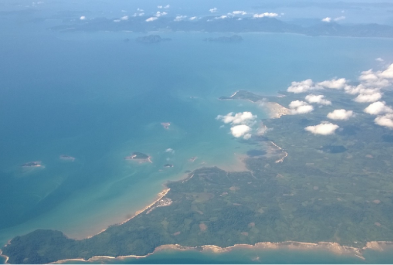 Besides oil palm, the concessions have rubber, forest, shrub, bare land and water bodies occupying the land. For instance, oil palm occupies as little as 6 percent of the concessions in Myeik district, pictured. (Go-Myanmar.com via Wikimedia Commons)