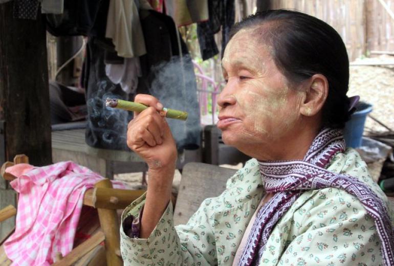 A woman at Mingun near Mandalay enjoys a cheroot. (David Stanley)