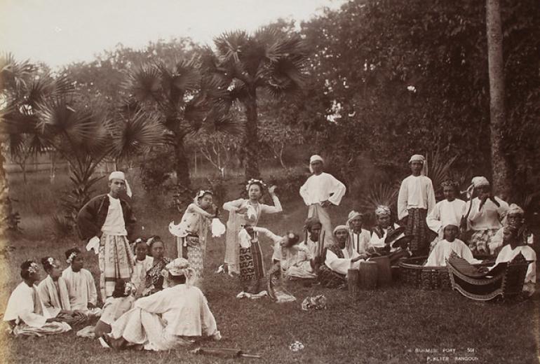 Burmese performers stage a play in a Rangoon park in 1907. (Philip Adolphe Klier / The National Archives UK)