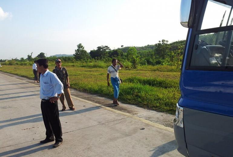 A stock photo of a bus on the Yangon-Mandalay highway. (Jon Evans / Flickr)