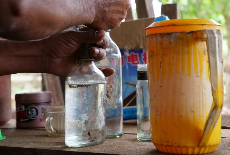 U Po Zo infuses the liquor with herbs. (Face of Indawgyi)