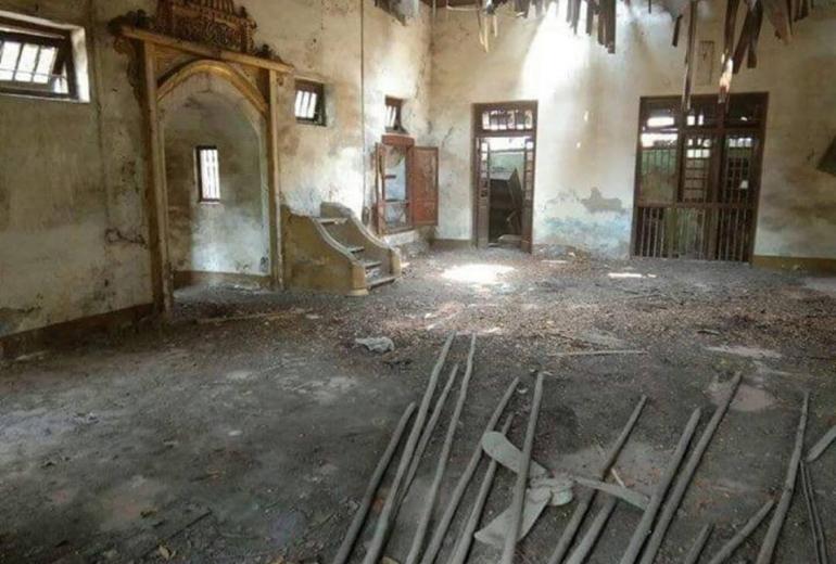 This photo from M Media is described as showing the inside of a damaged mosque in Chauk township. (M Media Group)