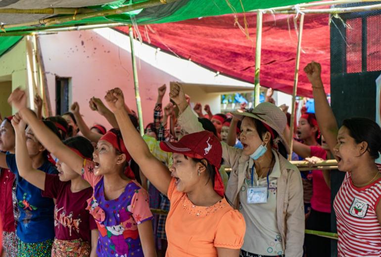 Garment workers in Dagon Seikkan protest outside a factory on April 7. (Faeez Safedien)