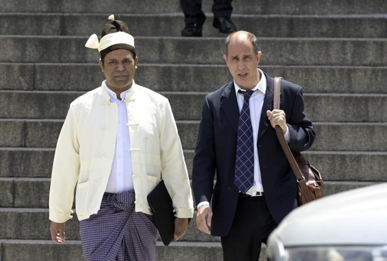  The President of The Burmese Rohingya Organisation UK (BROUK), Tun Khin (L) and Argentine human rights lawyer Tomas Ojea Quintana (R) leave Argentine federal court in Buenos Aires on November 13, 2019. (AFP)