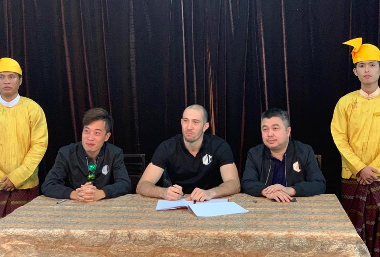 Dave Leduc (middle) signs with World Lethwei Championship on Saturday, March 9. (WLC / Facebook)