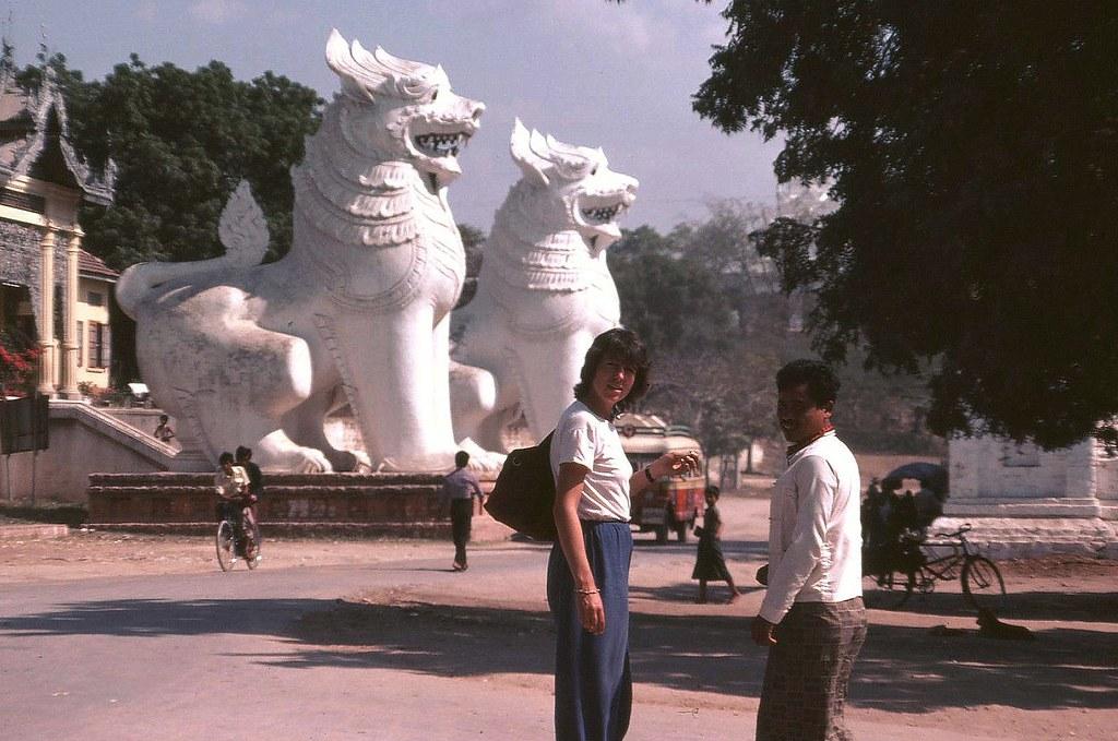 The summit of Mandalay Hill is flanked by two large chinthe.