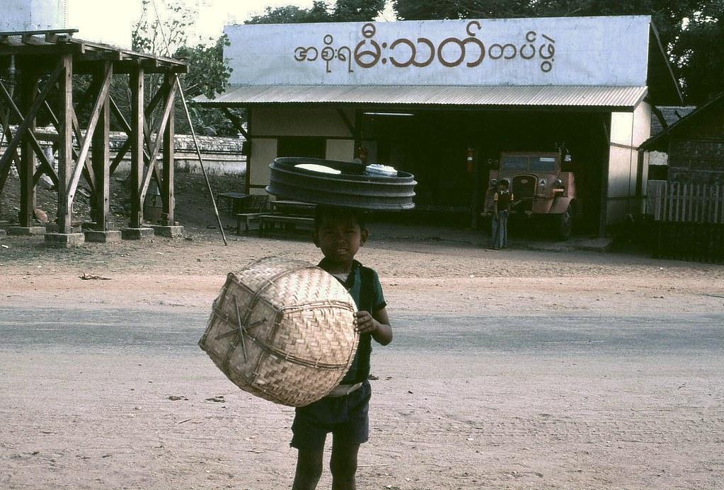 A boy stands outside a Bagan fire station.
