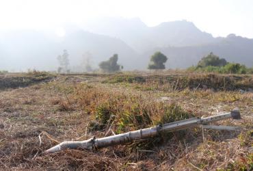  This photo taken on February 21, 2019 shows an unexploded ammunition lying on a field in Rathedaung township after fresh fighting in Rakhine state between the Myanmar military and the Arakan Army, an ethnic Rakhine force. (AFP)