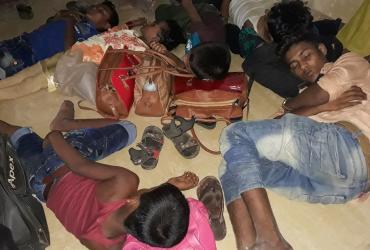  Young Rohingya refugees sleep in a police station before being returned to the camps in Cox’s Bazar on May 15, 2019, after they were rescued from going on a sea voyage to Malaysia. (Suzauddin Rubel / AFP)