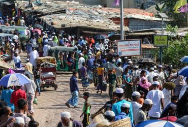 In this file photo taken on May 15, 2020 Rohingya refugees gather at a market as first cases of COVID-19 coronavirus have emerged in the area, in Kutupalong refugee camp in Ukhia. (Suzauddin Rubel / AFP)
