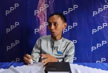 People's Pioneer Party's (PPP) candidate Myo Min Tun talks to the media in his office in Mandalay, ahead of the November 8 general election. Outraged over ongoing discrimination in Myanmar. (Ye Naing Ye / AFP)