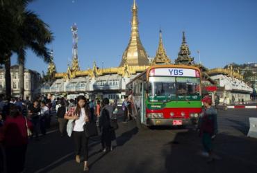A Yangon Bus Service (YBS) bus near Sule Pagoda in downtown Yangon. (Ye Aung Thu / AFP)