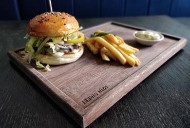 The 50th Street Bar Burger is a sample of the pub grub offered in the Yangon favourite. (Photos by Iryna Kyrylenko / Myanmar Mix)