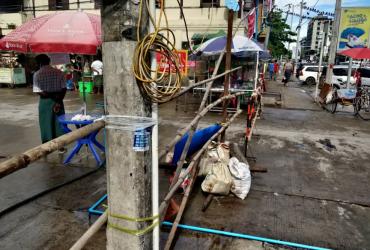 A makeshift barricade blocking upper 51 Street in downtown Yangon. (Myanmar Mix)