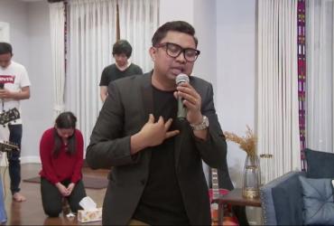 A screenshot of David Lah during a service that was broadcast online.