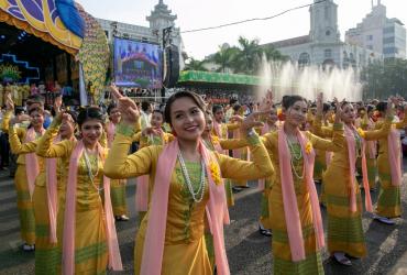  Dancers in traditional costumes perform during celebrations for the Thingyan festival, also known as the Buddhist New Year near Sule Pagoda on April 13. (Sai Aung / AFP)
